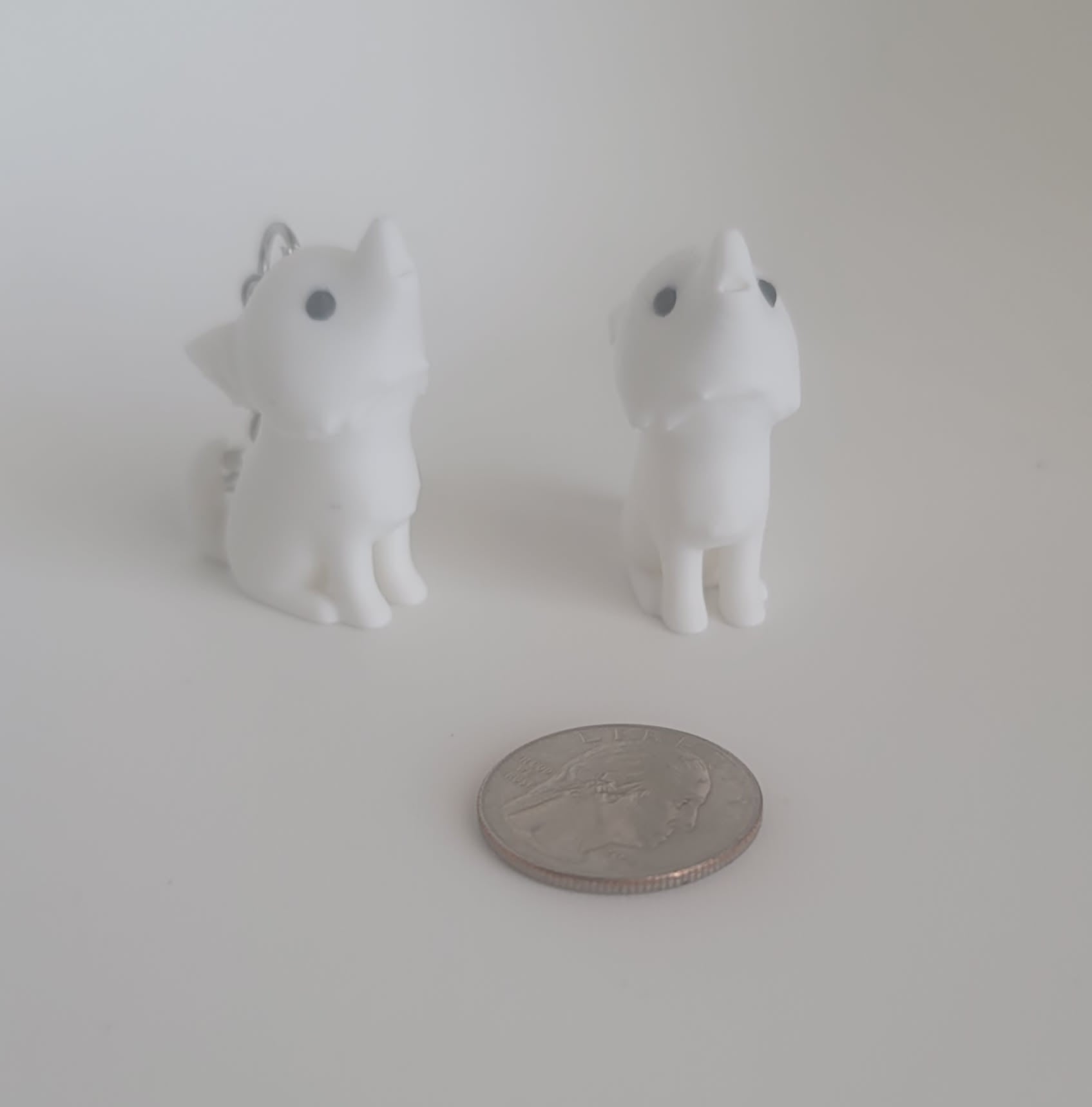 White 3D printed dire wolf keychain rear angle, fantasy fidget toy, Woody Burns Home Creations