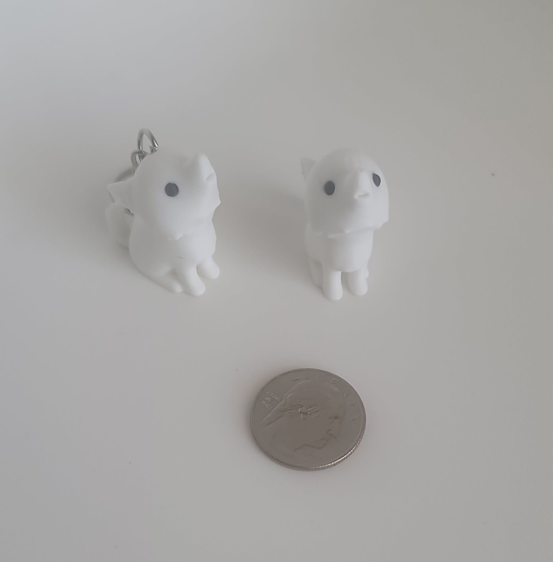 White 3D printed dire wolf side profile, keychain and desk toy, handmade in Reno NV