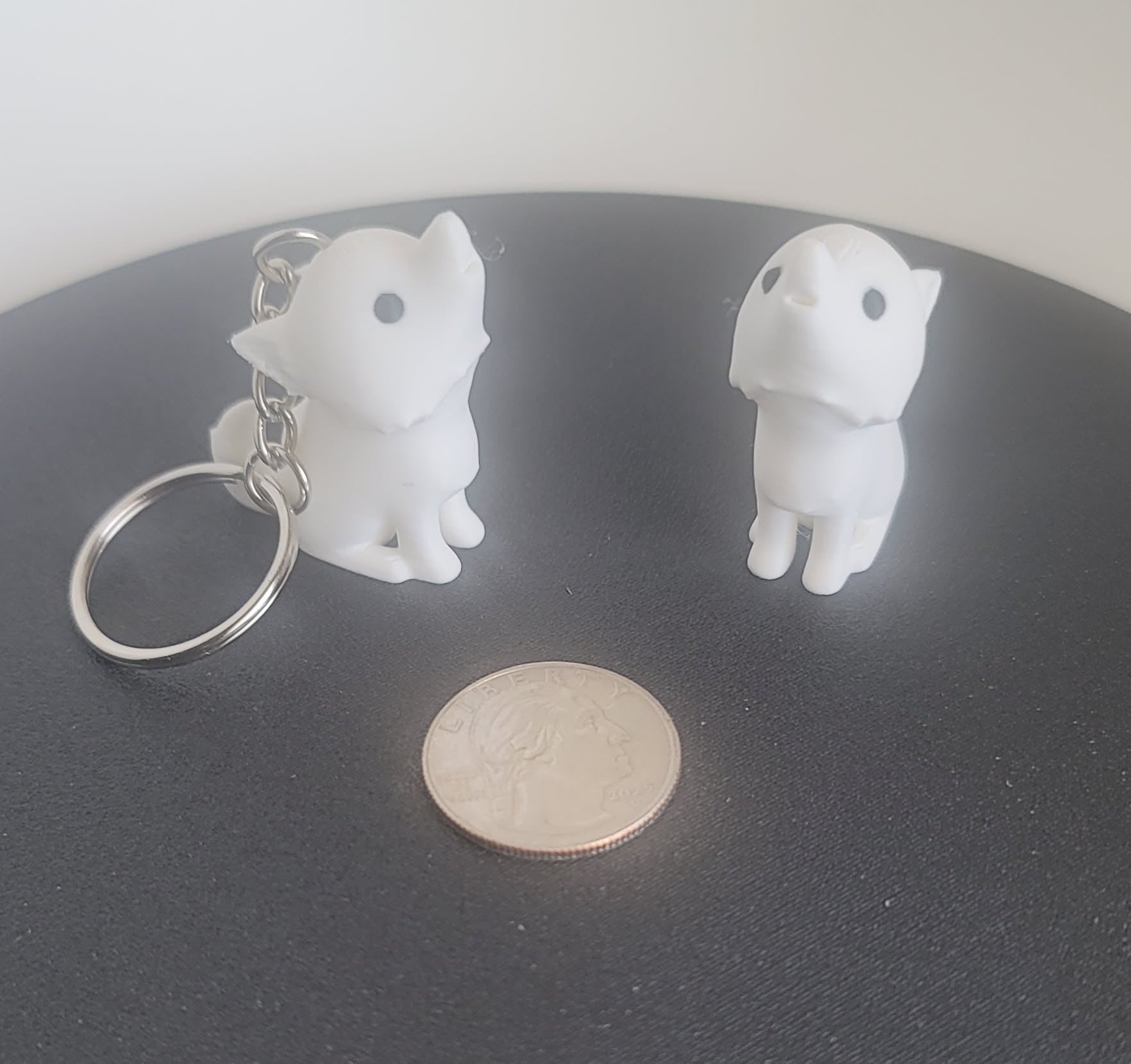 White dire wolf 3D printed keychain pair side view, fantasy fidget toy, Woody Burns Home Creations