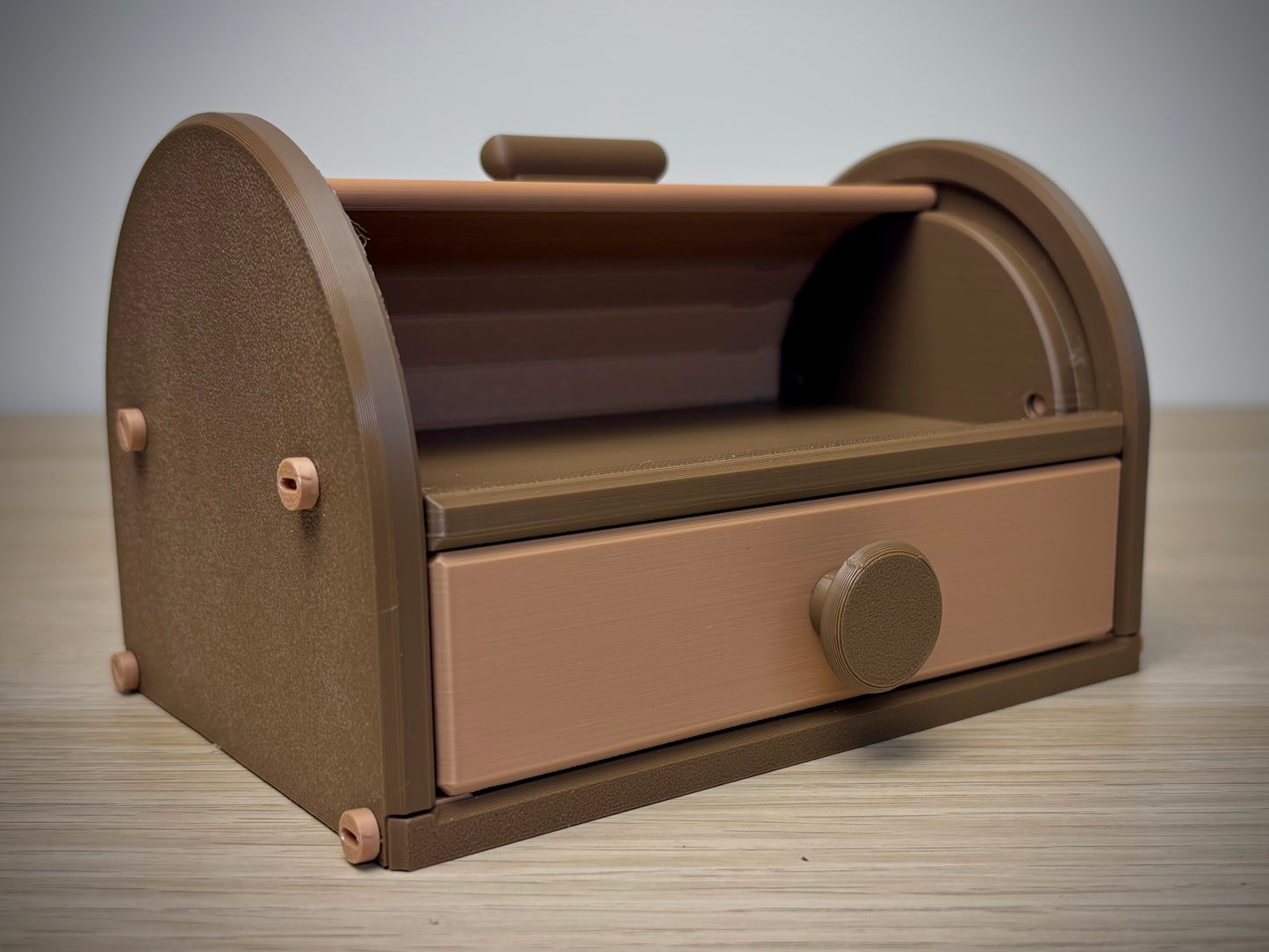 3D printed tambour roll-top box closed front view — warm Walnut & Tan two-tone finish, handmade in Reno NV